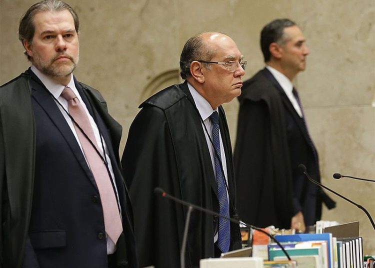 Dias Toffoli (esq.) é conhecido por adotar posições próximas às de Gilmar Mendes (ao centro)